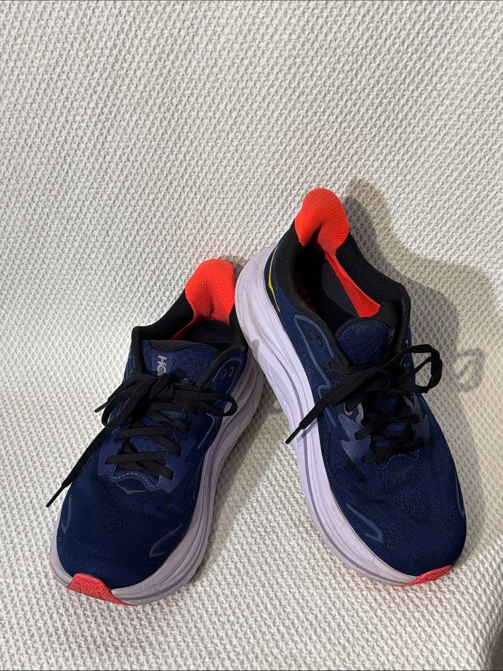 HOKA Sz 9B Clifton 10 Navy Running Shoes with Orange Accent Tab